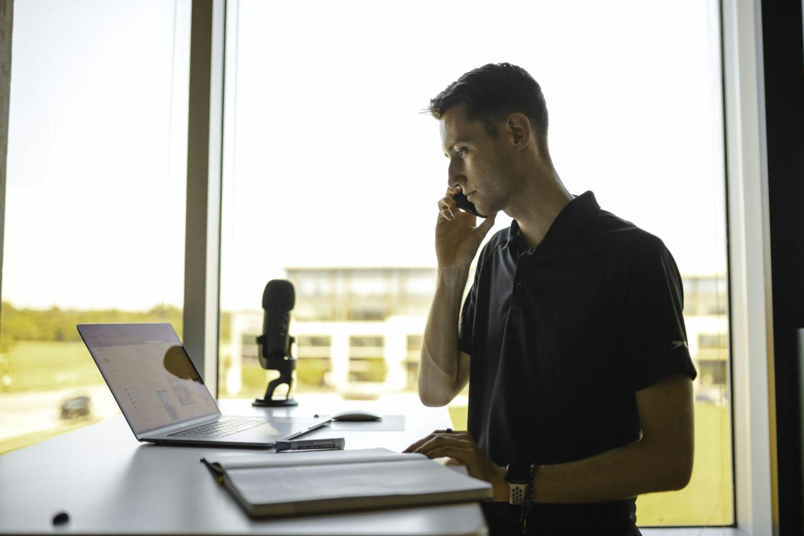 Business professional reviewing financial reports and metrics